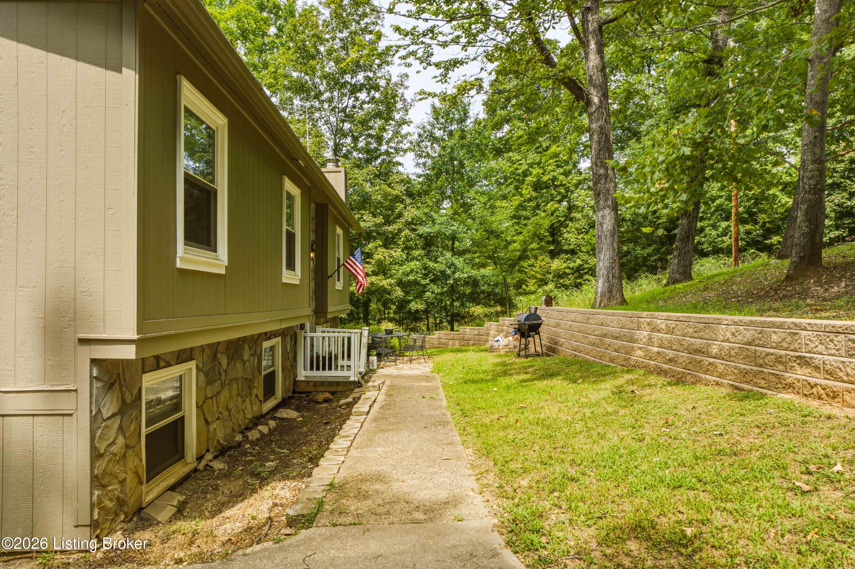 957 Wildflower Ridge Road Brandenburg, KY 40108 - Photo 48 of 70 60-Exterior-Side-Walkway