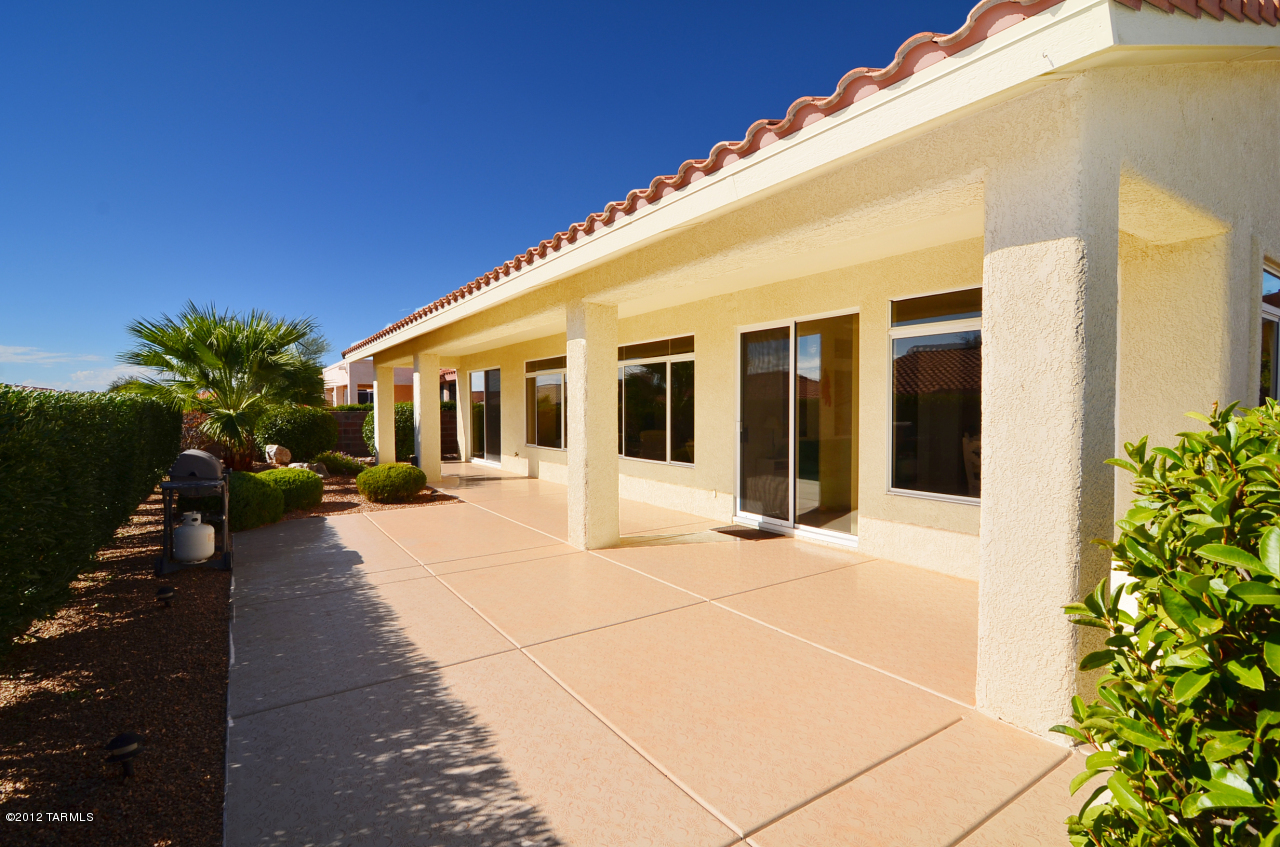 1330 East Crown Ridge Drive Tucson, AZ 85755 - Photo 19 of 22 a view of a house with backyard and sitting area