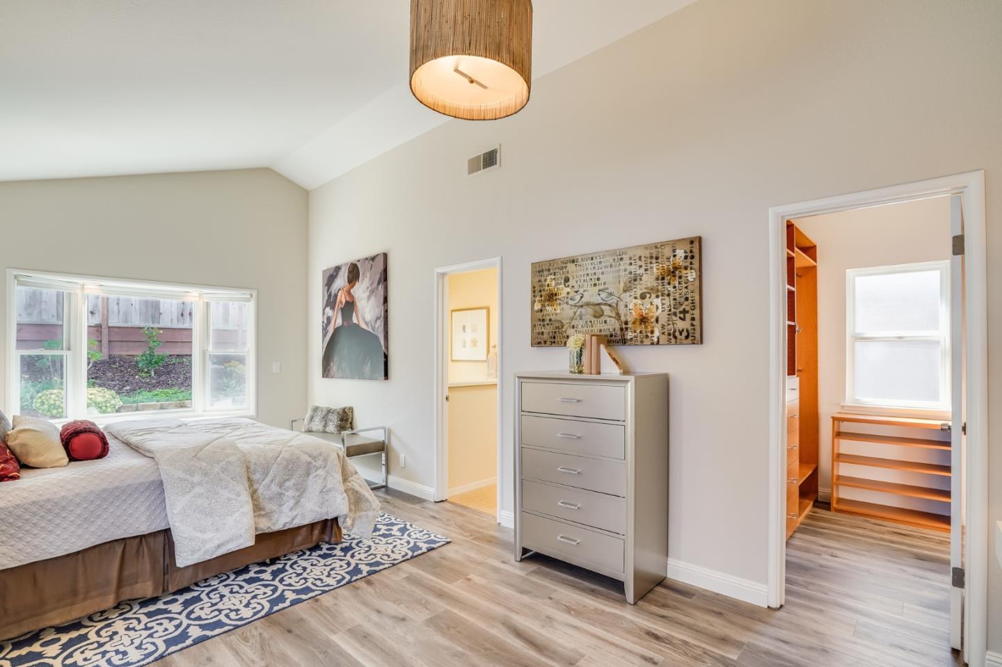 1684 Zinnia Lane San Jose, CA 95124 - Photo 14 of 33 a bedroom with a bed and wooden floor