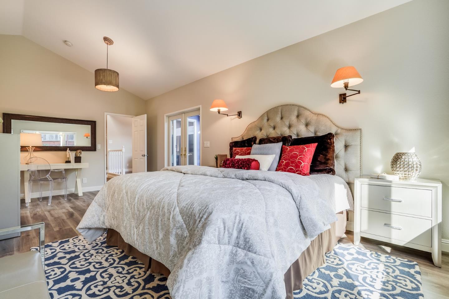 1684 Zinnia Lane San Jose, CA 95124 - Photo 17 of 33 a bed room with a bed and a chandelier