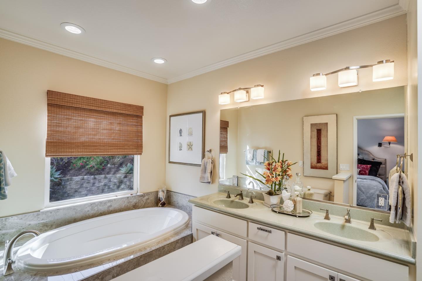 1684 Zinnia Lane San Jose, CA 95124 - Photo 18 of 33 a bathroom with a bathtub and a sink
