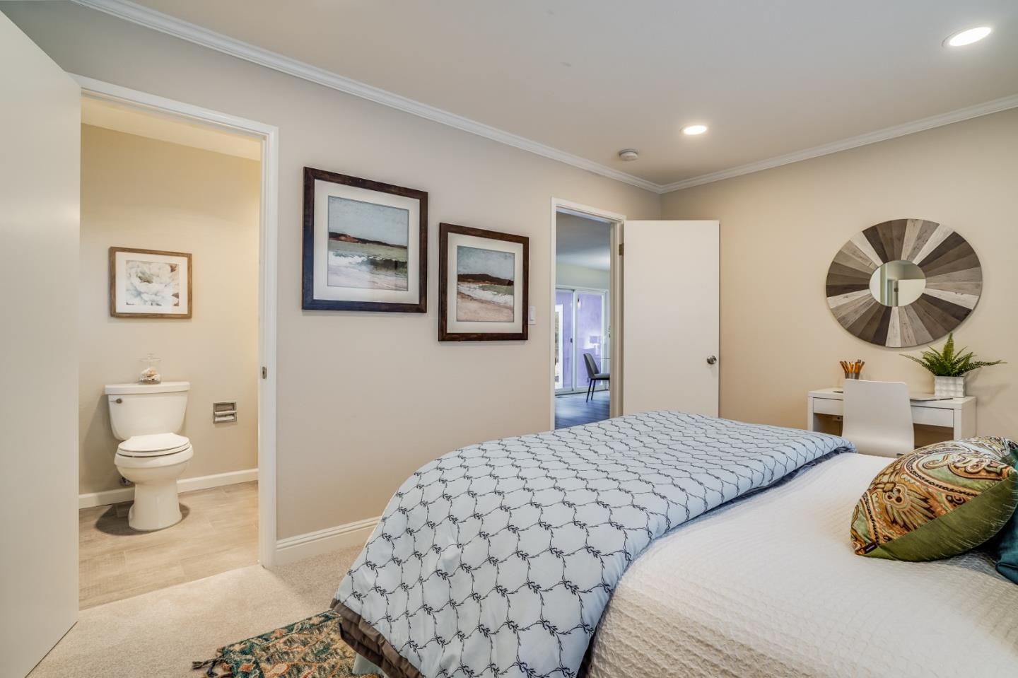 1684 Zinnia Lane San Jose, CA 95124 - Photo 23 of 33 a bedroom with a bed and painting on the wall