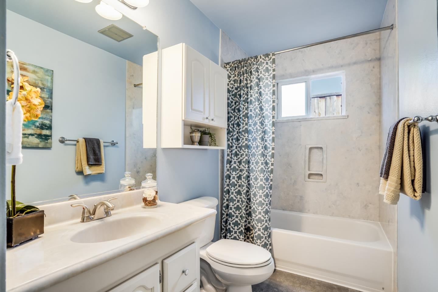 1684 Zinnia Lane San Jose, CA 95124 - Photo 28 of 33 a bathroom with a sink toilet and shower