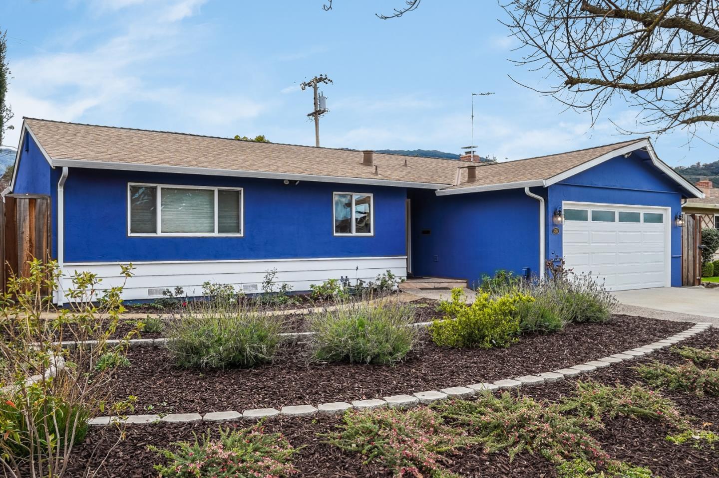 1684 Zinnia Lane San Jose, CA 95124 - Photo 3 of 33 a front view of a house with garden