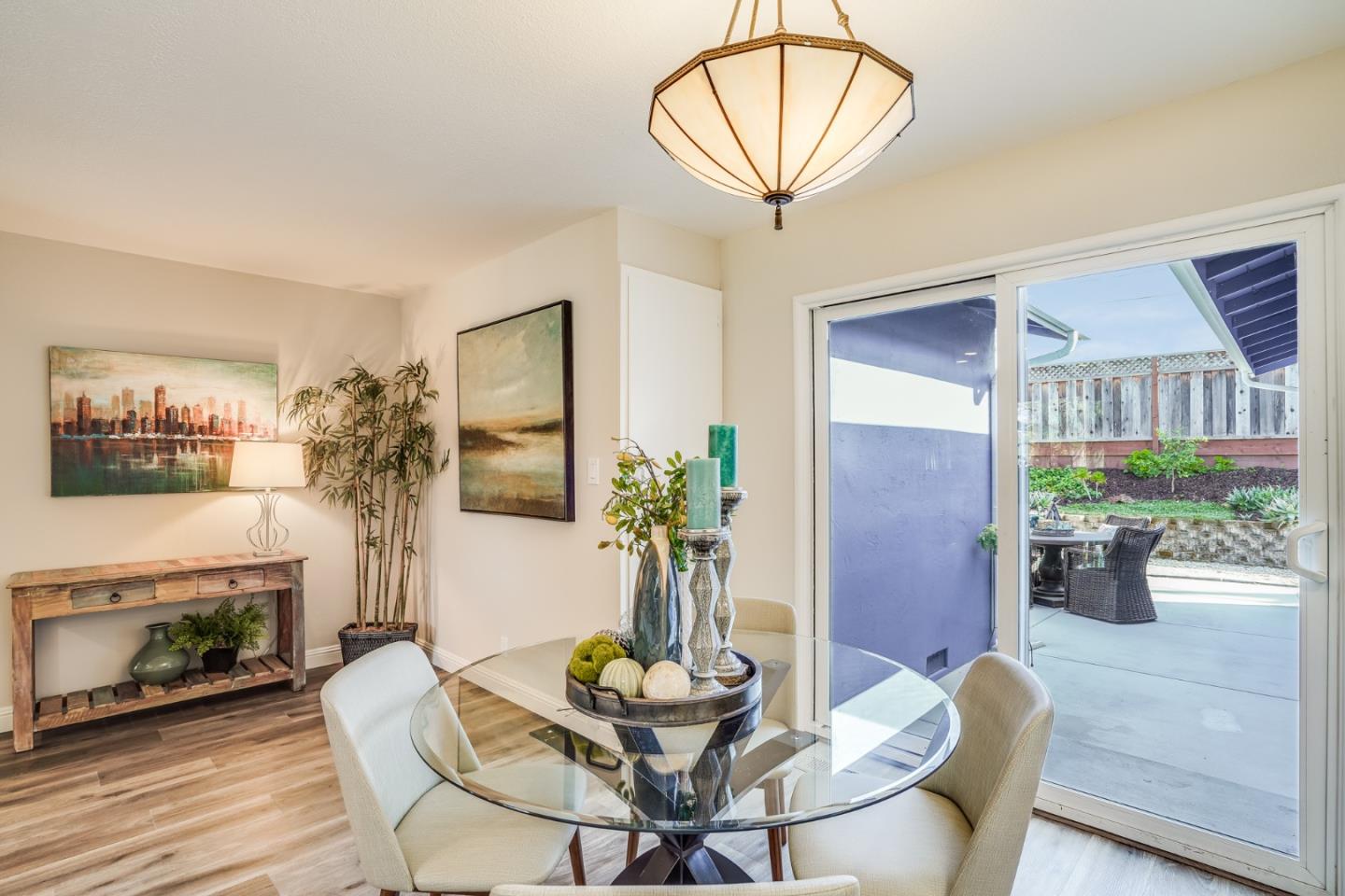 1684 Zinnia Lane San Jose, CA 95124 - Photo 9 of 33 a view of a dining room with furniture wooden floor and chandelier