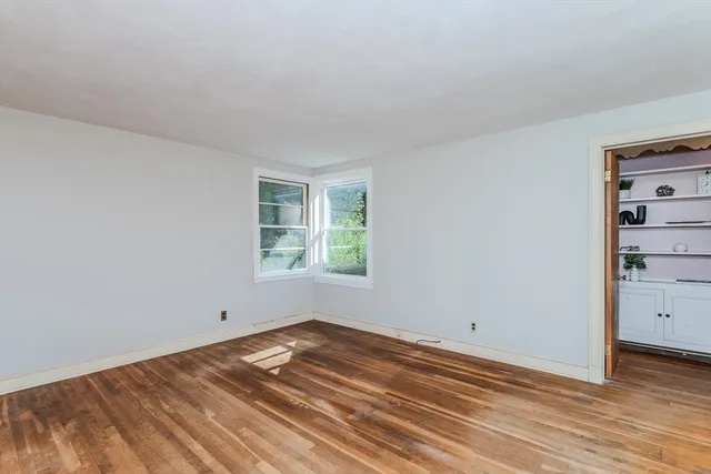 wooden floor and window in a room
