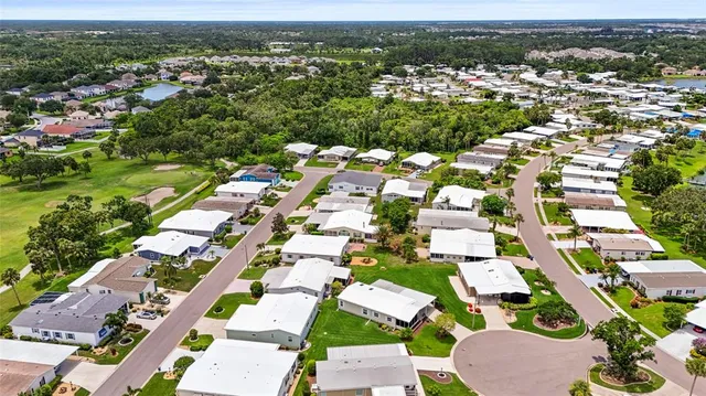 a living room with lots of furniture and white walls