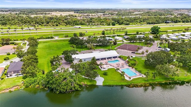 a view of a swimming pool with a lounge chair