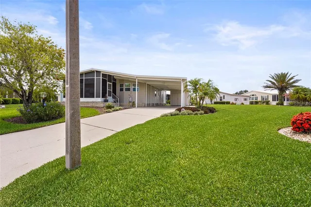 a view of a swimming pool with a lake view
