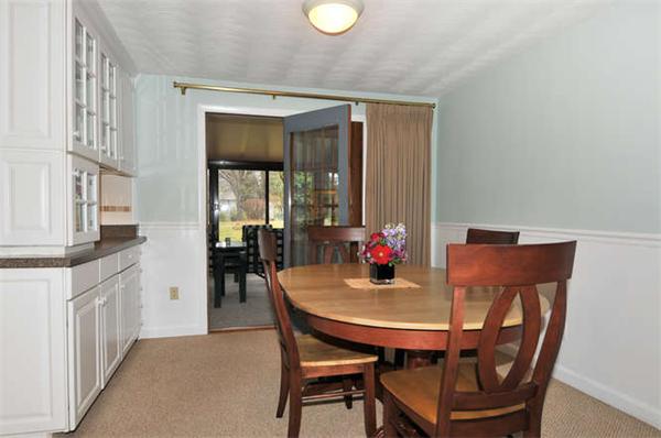 11 Doris Road Framingham, MA 01701 - Photo 9 of 21 a view of a dining room with furniture and a potted plant