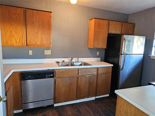 a bathroom with a toilet a sink and a bathtub
