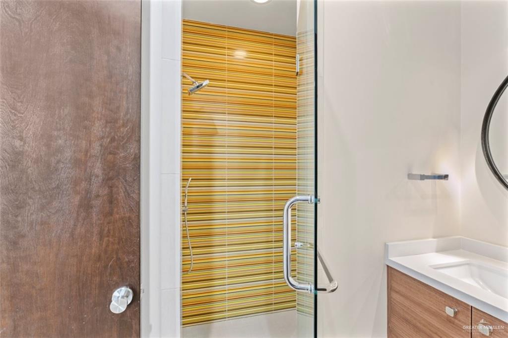 1425 Encanto Road, Unit SERVICE Weslaco, TX 78596 - Photo 23 of 45 Full bath featuring vanity and a shower stall