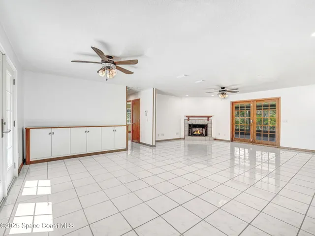 a kitchen with granite countertop a sink and a window