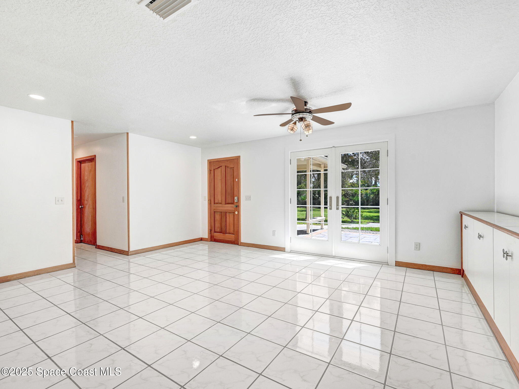 6570 Whispering Pines Lane Grant, FL 32949 - Photo 24 of 62 a view of an empty room with a window