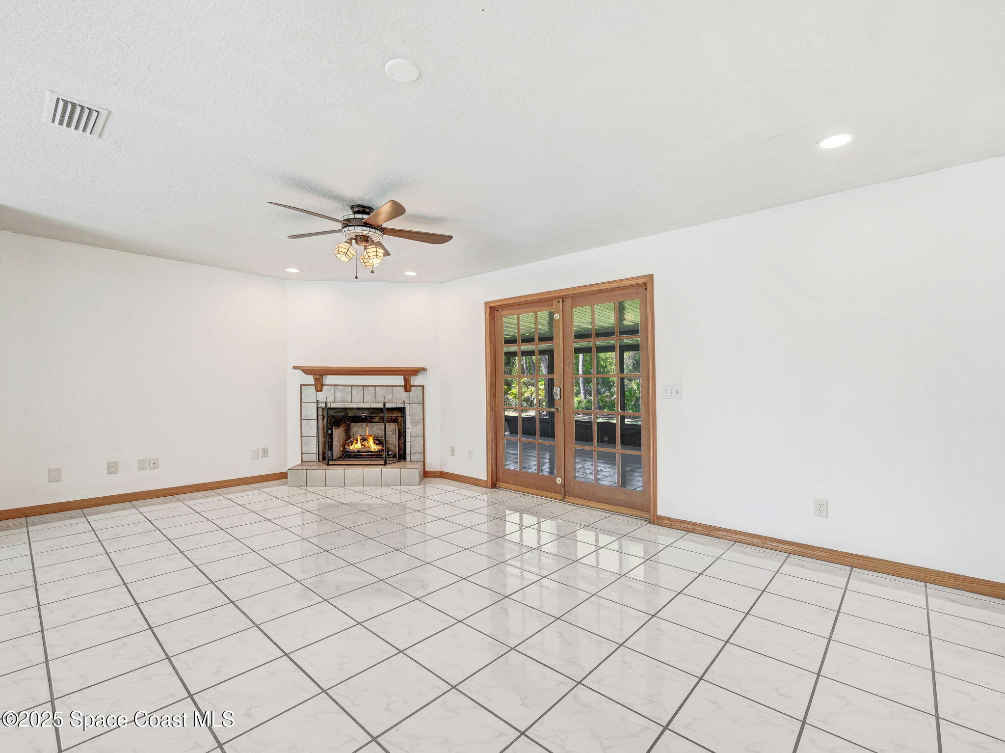 6570 Whispering Pines Lane Grant, FL 32949 - Photo 26 of 62 a view of an empty room with a window