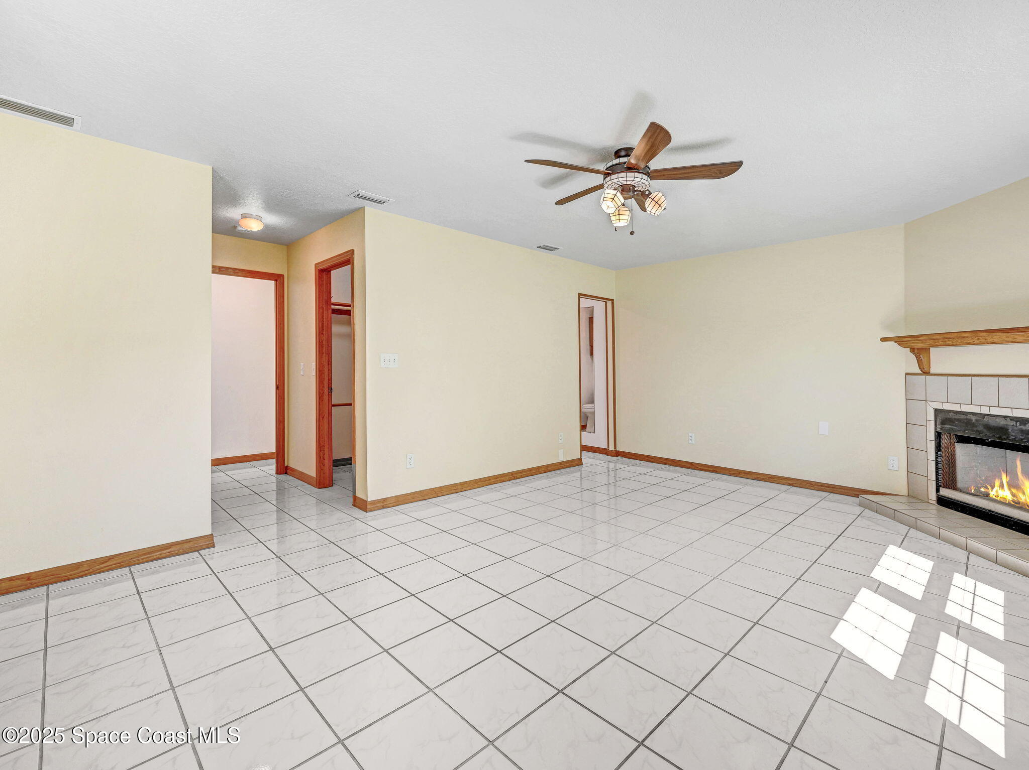 6570 Whispering Pines Lane Grant, FL 32949 - Photo 33 of 62 a view of a livingroom with a fireplace