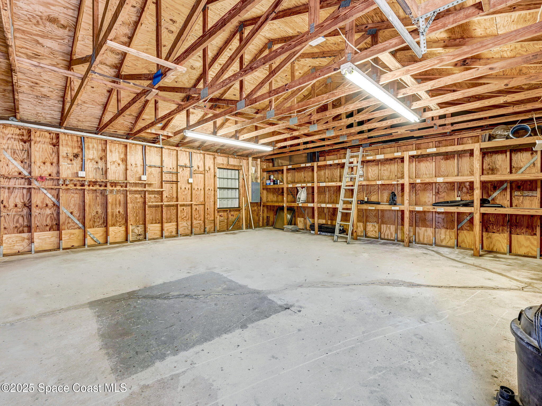 6570 Whispering Pines Lane Grant, FL 32949 - Photo 49 of 62 a view of an empty room with a garage