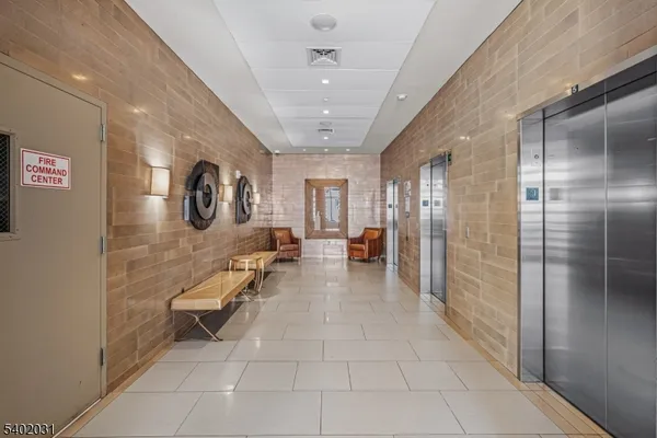 a lobby with entryway and couch