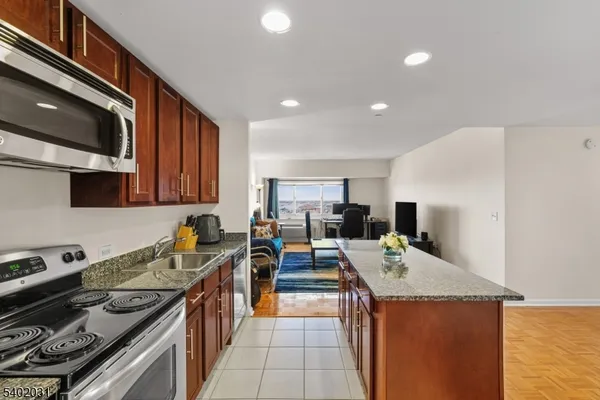 a kitchen with a stove and a sink