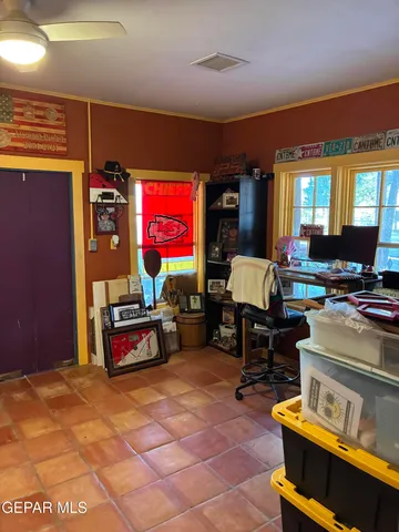 a view of backyard with swimming pool