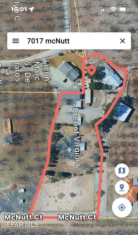 a room with gym equipment and windows