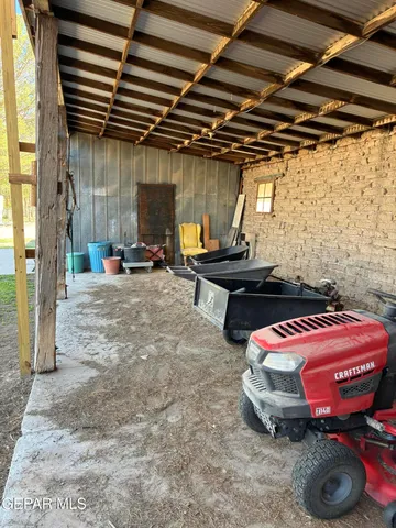 a kitchen with a sink and a potted plant on the counter