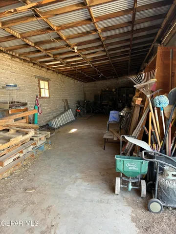 a view of a livingroom with furniture and a fireplace