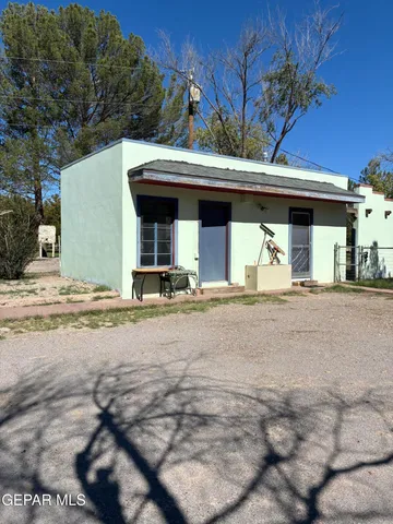 a view of a road with an ocean view