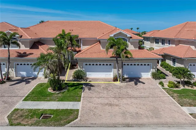 a front view of a house with a garage