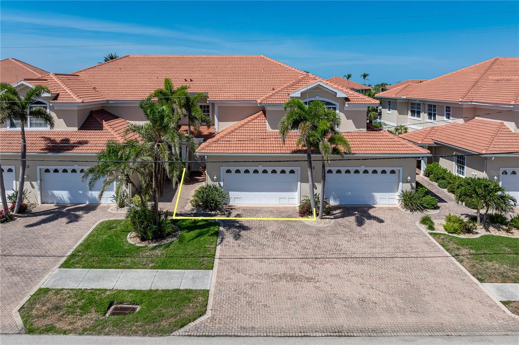 143 Tropicana Drive, Unit 1012 Punta Gorda, FL 33950 - Photo 13 of 55 front view of house with a yard