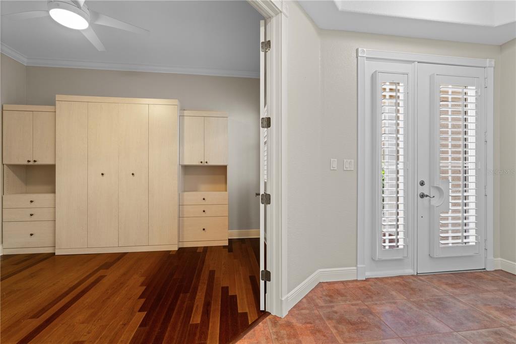 143 Tropicana Drive, Unit 1012 Punta Gorda, FL 33950 - Photo 17 of 55 wooden floor in an empty room with a window