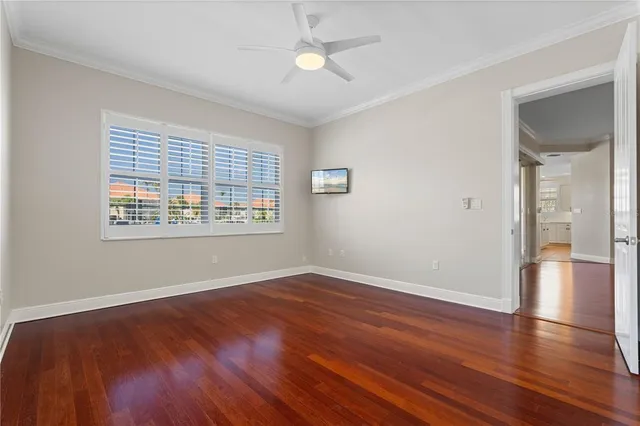 a bathroom with a tub sink shower and a mirror