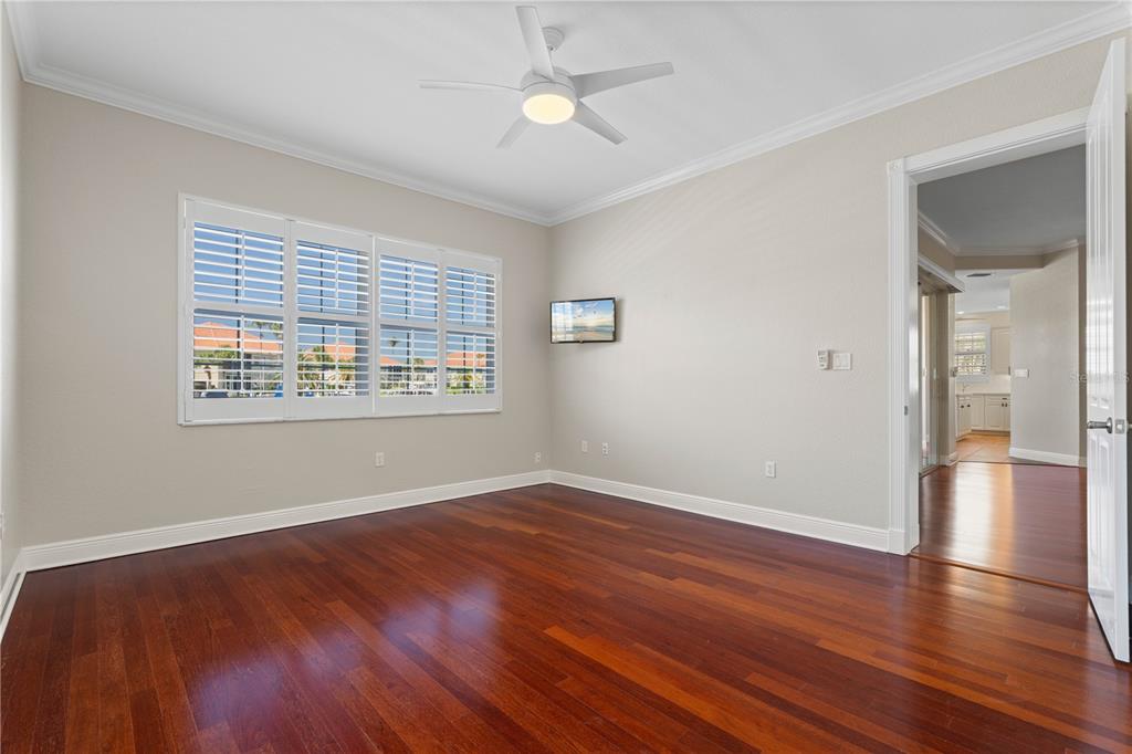 143 Tropicana Drive, Unit 1012 Punta Gorda, FL 33950 - Photo 29 of 55 wooden floor in an empty room with a window