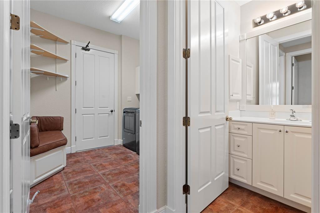 143 Tropicana Drive, Unit 1012 Punta Gorda, FL 33950 - Photo 38 of 55 a bathroom with a sink and a mirror