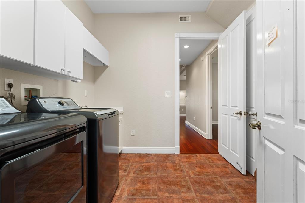 143 Tropicana Drive, Unit 1012 Punta Gorda, FL 33950 - Photo 40 of 55 a view of hallway with washer and dryer