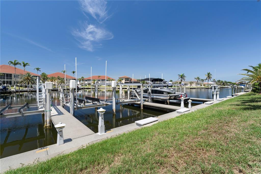 143 Tropicana Drive, Unit 1012 Punta Gorda, FL 33950 - Photo 46 of 55 a view of a lake with a ocean view