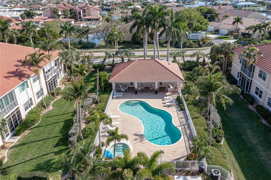 143 Tropicana Drive, Unit 1012 Punta Gorda, FL 33950 - Photo 49 of 55 an aerial view of a house with outdoor space and lake view