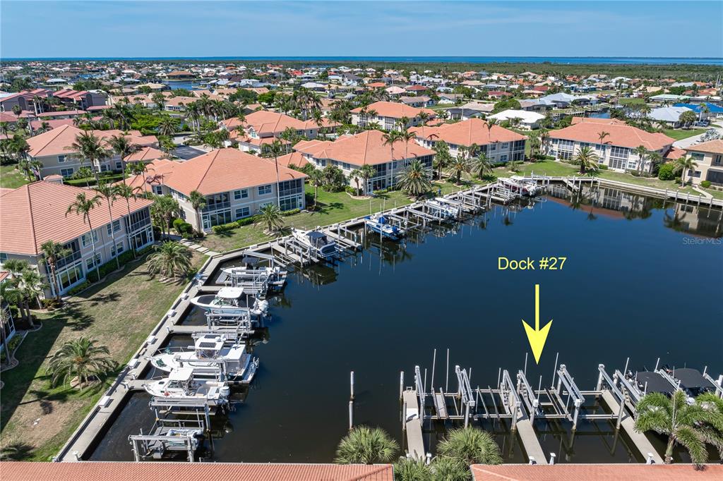 143 Tropicana Drive, Unit 1012 Punta Gorda, FL 33950 - Photo 53 of 55 an aerial view of residential houses with outdoor space