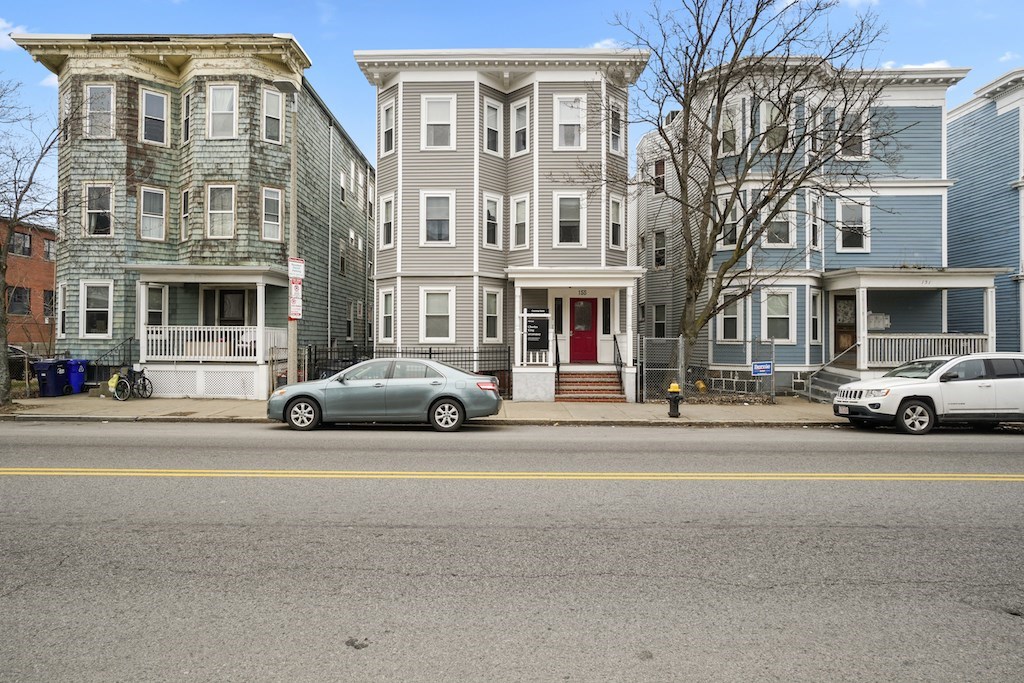 155 Boston Street, Unit 3 Boston, MA 02125 - Photo 13 of 15 a couple of cars parked in front of a building
