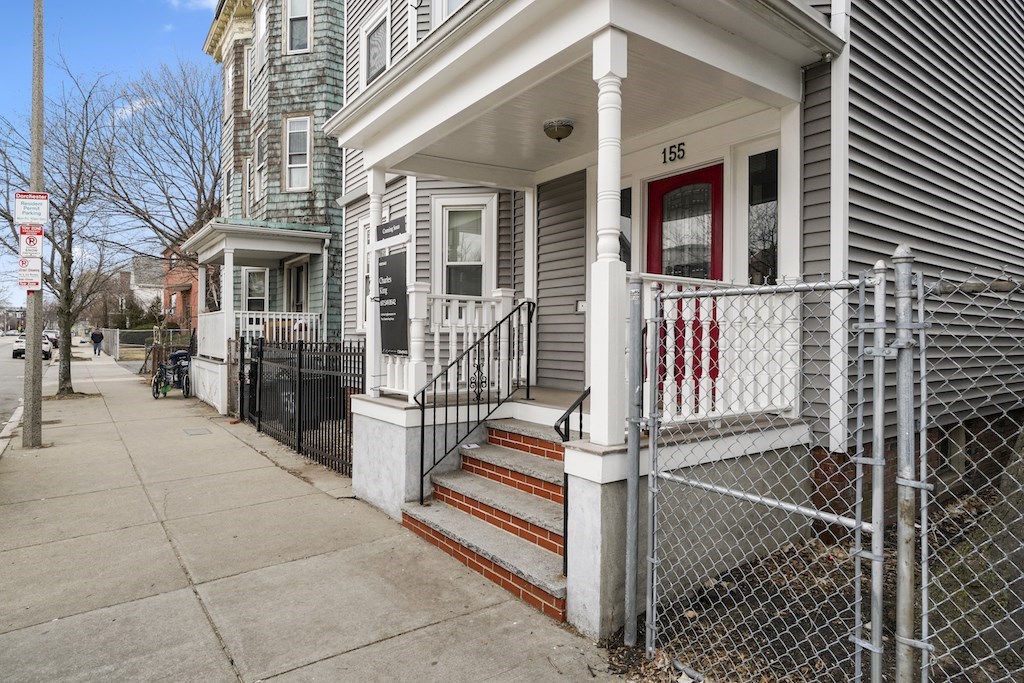 155 Boston Street, Unit 3 Boston, MA 02125 - Photo 14 of 15 a view of a brick house with a large window