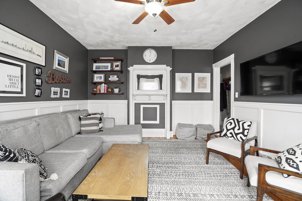 155 Boston Street, Unit 3 Boston, MA 02125 - Photo 4 of 15 a living room with furniture and a flat screen tv