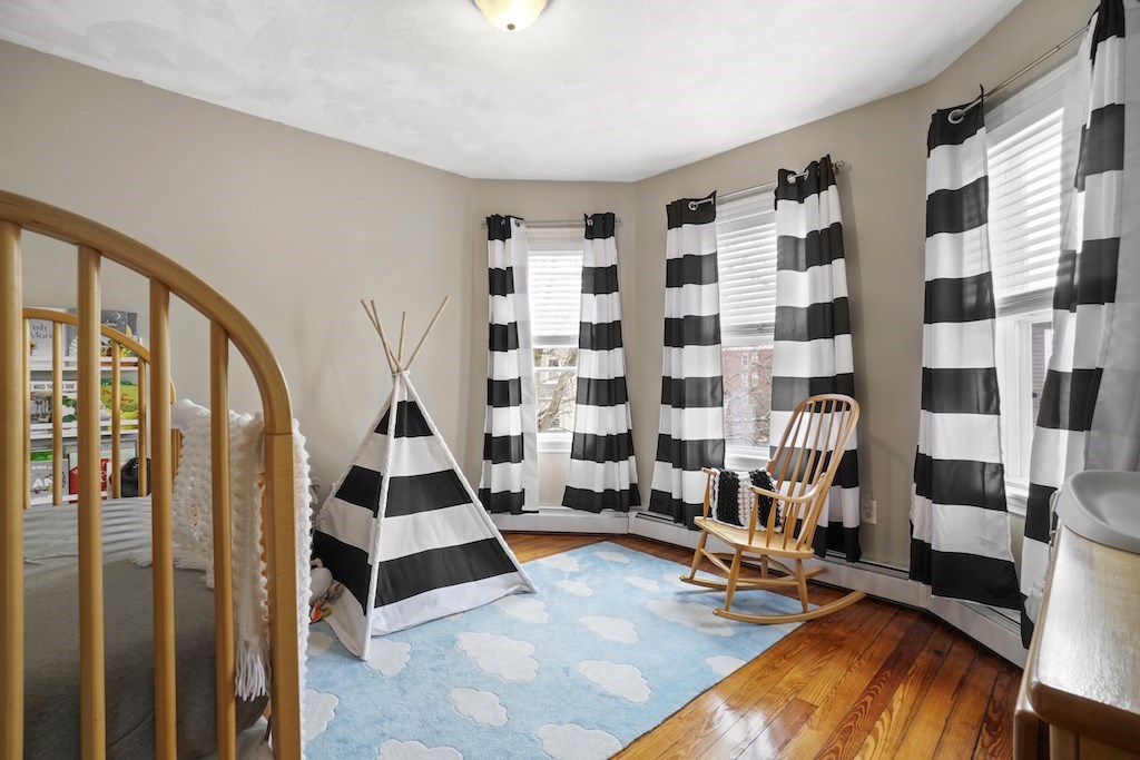 155 Boston Street, Unit 3 Boston, MA 02125 - Photo 9 of 15 a view of a room with gym equipment