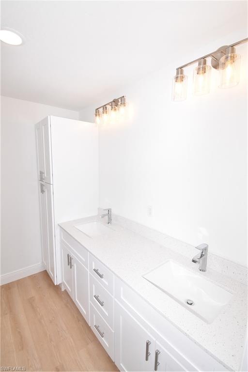 5051 Foxhall Road North Port, FL 34288 - Photo 18 of 27 a bathroom with a sink and a mirror