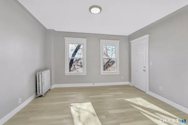 an empty room with windows