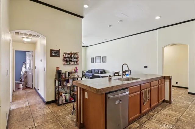 a kitchen with a sink and cabinets