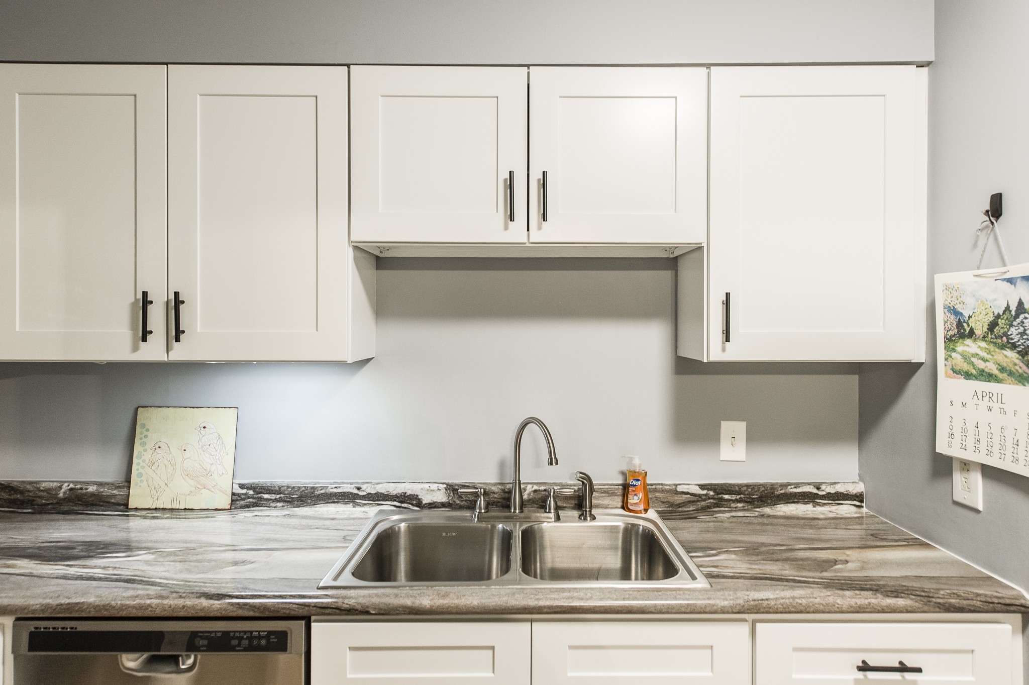 200 Sanders Ferry Road, Unit 2103 Hendersonville, TN 37075 - Photo 29 of 53 a kitchen with a sink and cabinets