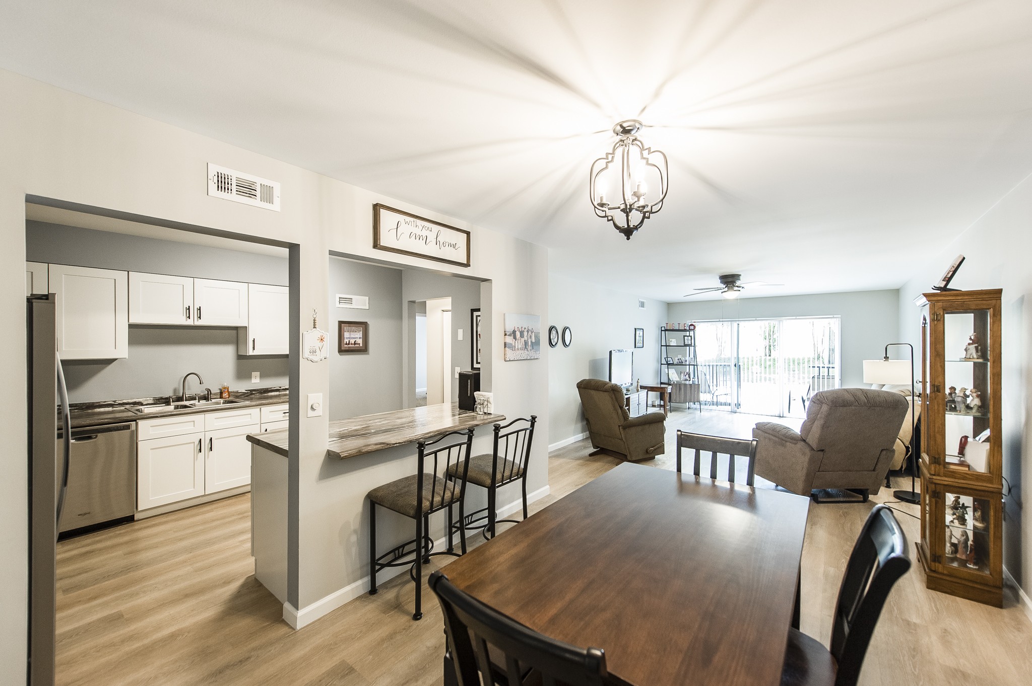 200 Sanders Ferry Road, Unit 2103 Hendersonville, TN 37075 - Photo 35 of 53 a view of a dining room with furniture window and wooden floor