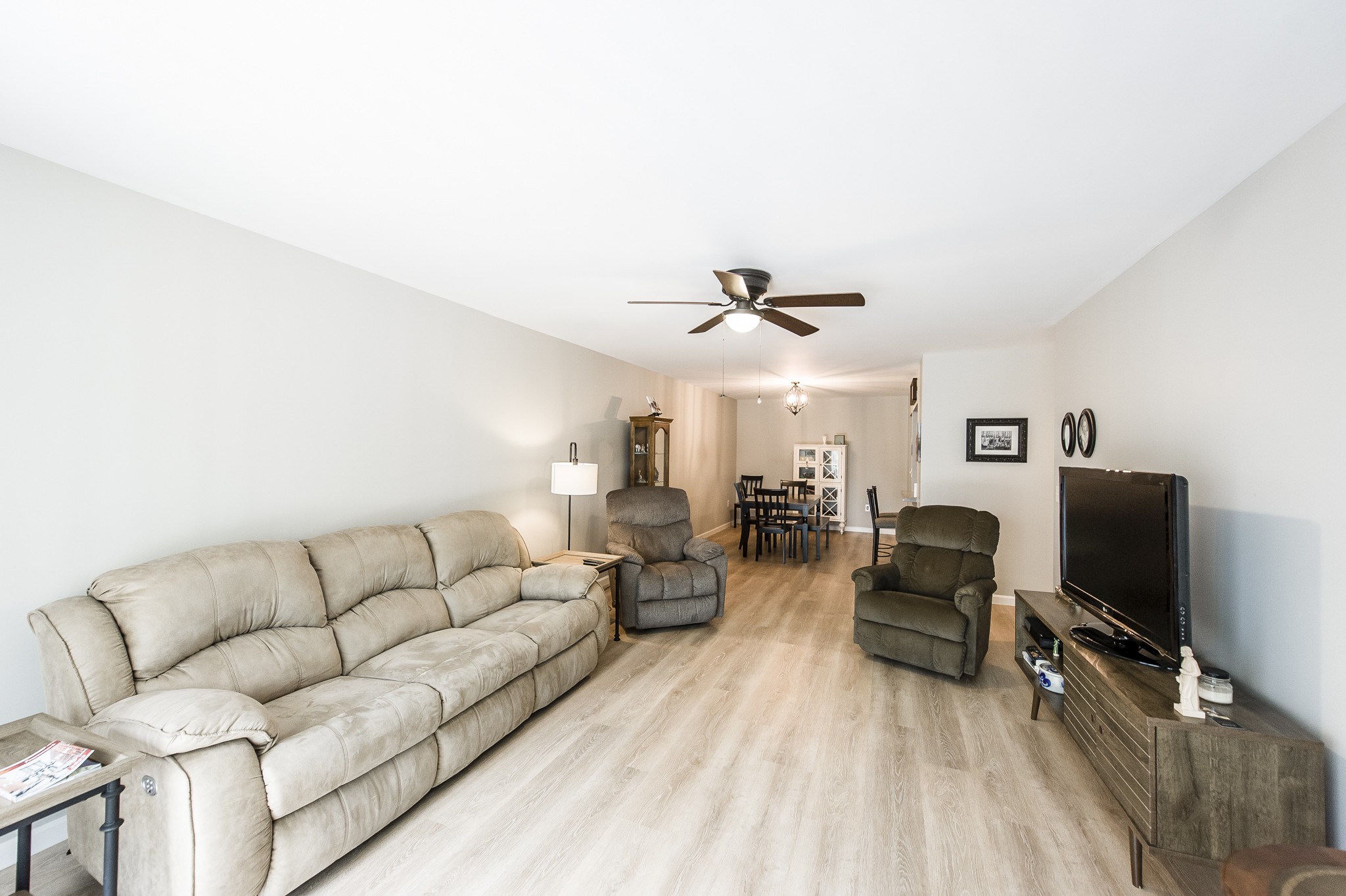200 Sanders Ferry Road, Unit 2103 Hendersonville, TN 37075 - Photo 39 of 53 a living room with furniture and a flat screen tv
