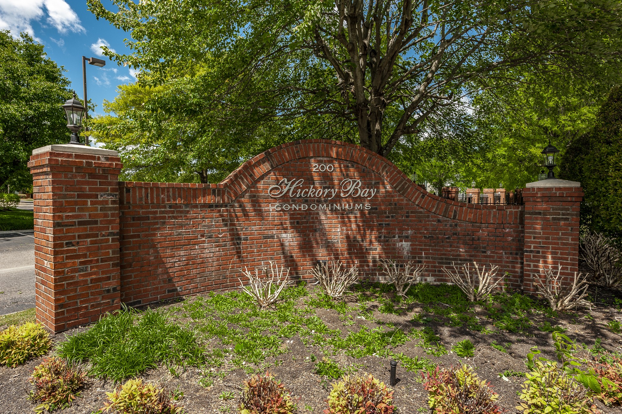 200 Sanders Ferry Road, Unit 2103 Hendersonville, TN 37075 - Photo 51 of 53 a view of a wooden fence next to a brick building