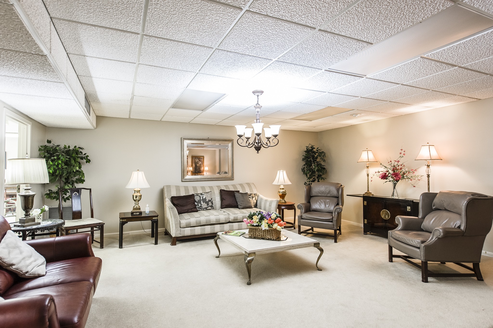 200 Sanders Ferry Road, Unit 2103 Hendersonville, TN 37075 - Photo 9 of 53 a living room with furniture and a chandelier